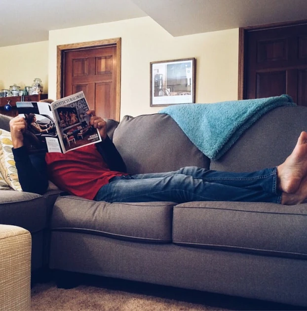 image of a woman on couch relaxing